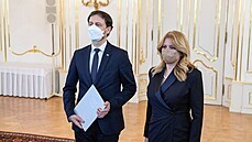 Slovenský ministr financí Eduard Heger s prezidentkou Zuzanou Čaputovou v...