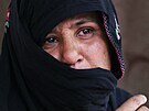 Afghánka, která bhem váleného konfliktu ztratila ást píbuzenstva. (22....