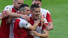 Radost hrá�� Slavie po vst�elené brance proti Spart�