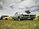 Jeden z prvních muscle car  Pontiac GTO, roník 1966, bezmála 6,5litrový...