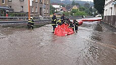 Voda v Dolní Poustevně během chvilky zatopila několik desítek domů. Na pomoc... | na serveru Lidovky.cz | aktuální zprávy