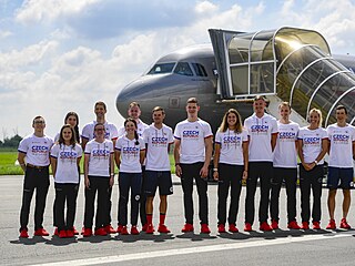 Čeští sportovci před odletem do Tokia 16. července.