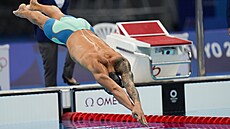 Caeleb Dressel po startu semifinále 100 metr motýlek na olympijských hrách v...