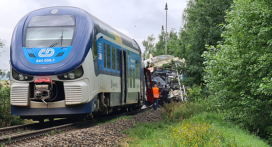 Ve st�edu po osmé hodin� ráno se na Doma�licku srazily dva vlaky. (4. srpna...