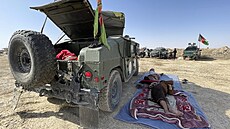 Afghánští vojáci spí nedaleko města Kandahár jihozápadně od Kábulu. (13. srpna...