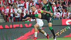 Slávistický kapitán Stanislav Tecl se v utkání s Ferencvárosem pokouší... | na serveru Lidovky.cz | aktuální zprávy
