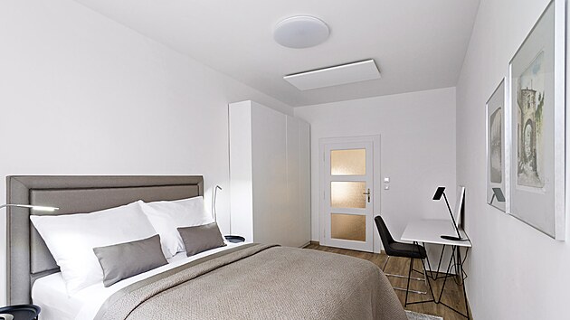 Tlumené uklidňující barvy a komfortní postel od Ambience Design jsou hlavními prvky ložnice. Vešel se tam i minimalistický pracovní stůl a vysoká šatní skříň.