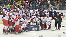 České hokejistky slaví postup na olympijské hry v Pekingu.