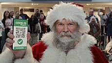 Santa Claus s covid pasem ve Vnon reklam Tesco