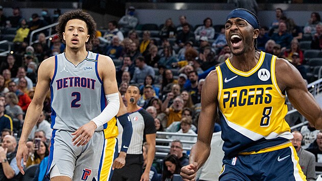 Justin Holiday (8) z Indiana Pacers slav svou sme proti Detroit Pistons, sleduje ho Cade Cunningham.