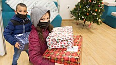 Zavedenou dobro�inností je ka�doro�ní akce Krabice od bot.