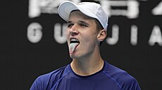 Jakub Meník se hecuje ve finále juniorky Australian Open.