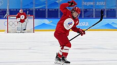 Ruská hokejistka Anna ibanovová se raduje poté, co skórovala proti výcarsku..