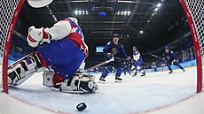 Olympijský turnaj mu v ledním hokeji. Finsko - Slovensko. Branká Slovenska...