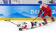 Olympijský turnaj mu v ledním hokeji. Na snímku Roman ervenka v akci. (11....