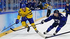 Olympijský turnaj v ledním hokeji. Zápas Finsko - védsko. véd Carl Klingberg...