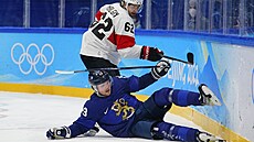 Olympijský turnaj v ledním hokeji. Finsko - výcarsko. Fin Valtteri Kemilainen...