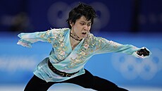 Juzuru Hanju bhem své volné jízdy na olympiád v Pekingu.