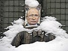 Rozstílený portrét Vladimira Putina na pozicích ukrajinské armády v Luhanské...