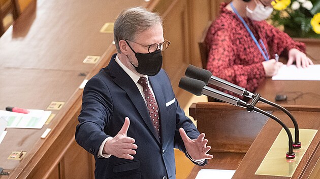 Premir Petr Fiala vystoupil na mimodn schzi Poslaneck snmovny k problematice dolu Turw. (22. nora 2022)