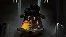 tybob Nmce Christopha Hafera bhem tetí jízdy olympijského závodu v Pekingu.