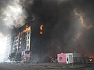 Obytné domy po bombardování v Kyjev na Ukrajin. (3. bezna 2022)