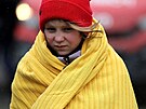 Ukrajinská dívka na hraniním pechodu v Siret v Rumunsku (1. bezna 2022)