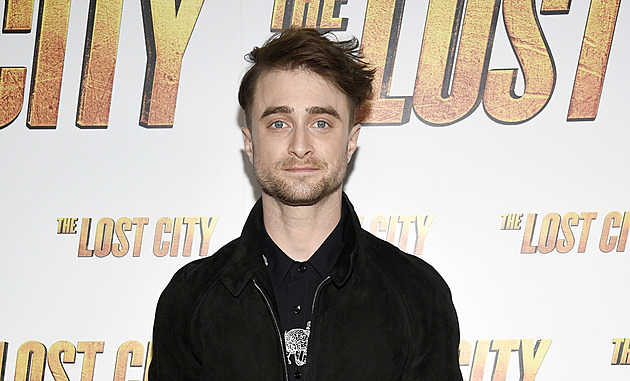 Radcliffovi se podařilo utajit, že už je tatínek. Vyfotili ho s kočárkem