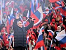 Ruský prezident Vladimir Putin na stadionu v moskevských Lunikách (18. bezna...