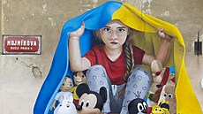 Streetartový umlec Chemis maloval 17. bezna 2022 v praských Nuslích mural na...