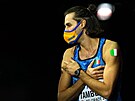 Italský výka Gianmarco Tamberi nosí na ramenou italskou i ukrajinskou vlajku,...