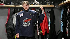 Šestnáctiletý ukrajinský hokejista Nazar Komisar našel přechodné zázemí v...