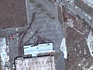 Nové satelitní snímky ukazují zkázu v Mariupolu. (29. bezna 2022)