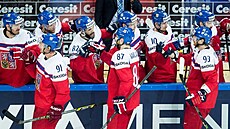 etí hokejisté (zleva) Martin Erat, Jakub Nakládal a Jakub Voráek se radují...