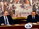 Bývalý italský premiér Silvio Berlusconi a ruský prezident Vladimir Putin na...