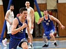 Basketbalista Kyle Mangas z USK Praha se raduje z vítzné trojky v utkání v...