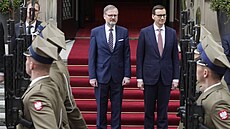 Český premiér Petr Fiala (vlevo) se svým polským protějškem Mateuszem...