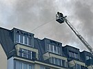 Hasi�i zasahuj� u po��ru bytu na pra�sk�m Chodov�, kter� se roz���il i do...