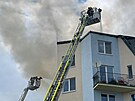 Hasi�i zasahuj� u po��ru bytu na pra�sk�m Chodov�, kter� se roz���il i do...
