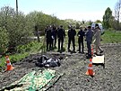 Ukrajinská policie objevila u Kyjeva masový hrob. Mezi ostatky byly doklady...