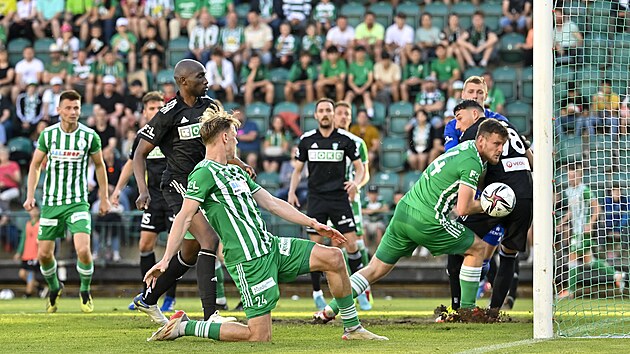 David Puškáč (middle) from Bohemians scores his fourth goal in the match against ...