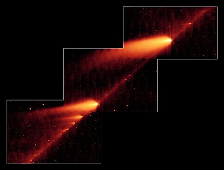 Snímek v infraerveném spektru ze Spitzerova vesmírného dalekohledu ukazuje...