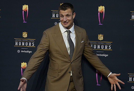 Rob Gronkowski pichází na akci poádanou ligou amerického fotbalu NFL.