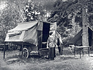 Roshanara in Front of Camp Trailer at Dorr Point (1922)