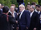 Britský premiér Boris Johnson (uprosted) po boku nmeckého kanclée Olafa...