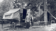 Roshanara in Front of Camp Trailer at Dorr Point (1922)