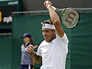 Slovenský tenista Alex Molan ve tetím kole Wimbledonu.