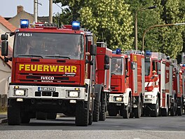 N�me�tí hasi�i bojují s rozsáhlým po�árem v Braniborsku. (26. �ervence 2022)