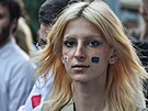 Do ulic Tbilisi s vlajekami na tvái vyli demonstrovat i studenti. (3....
