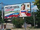 Propagandistický plakát v okupovaném Chersonu se sdlením: Rusko je zde...
